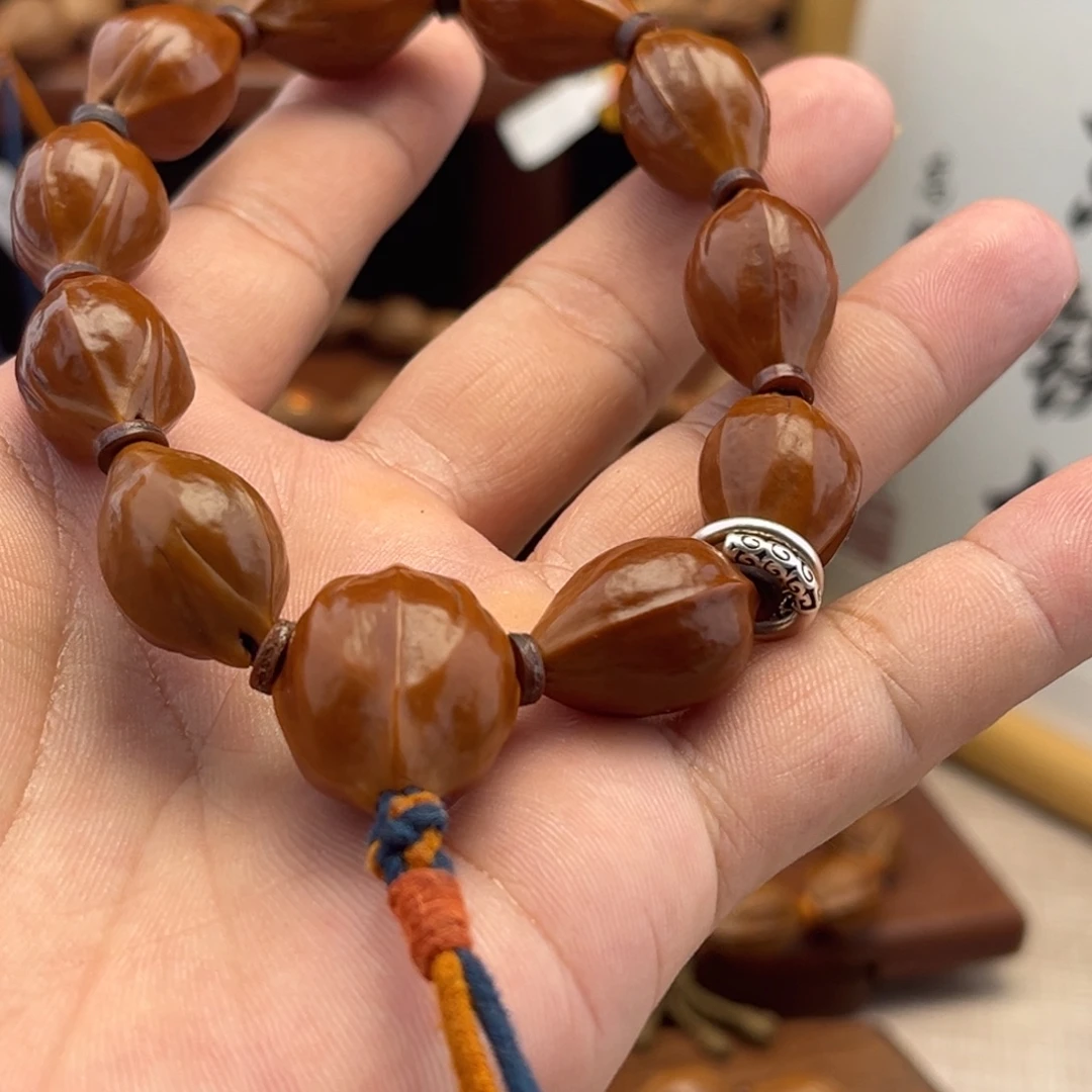 爱***面橄榄核手串三面佛