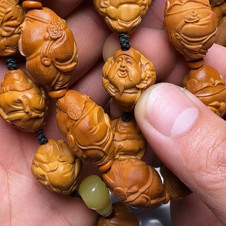 橄榄核手串你是谁