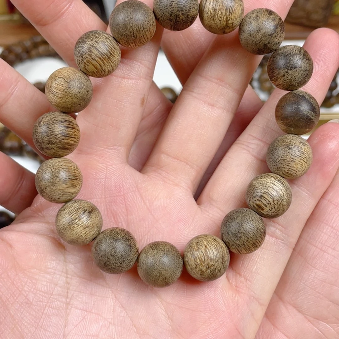 沉香手串【****珠菩萨棋树心老料1.3