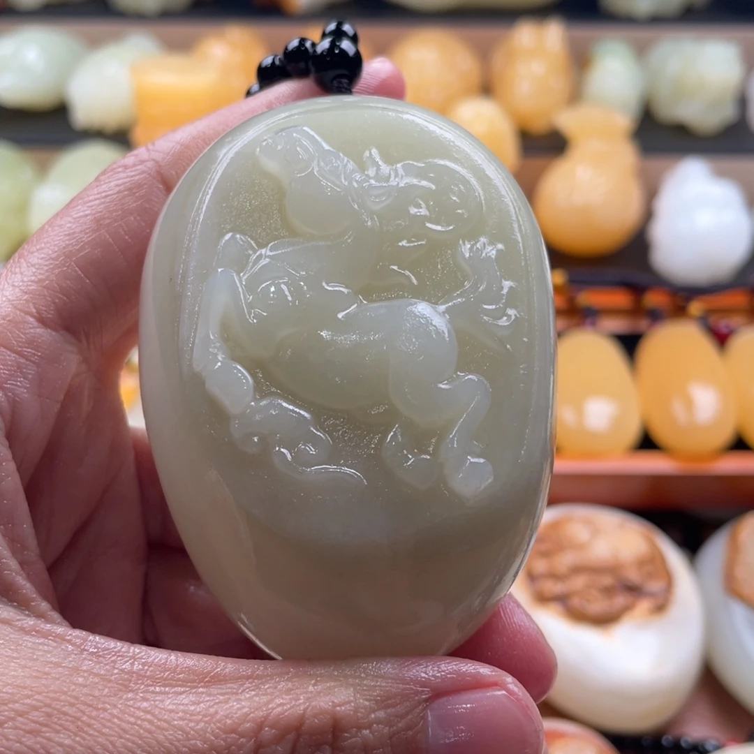再***缘石材天然古青石手把件
