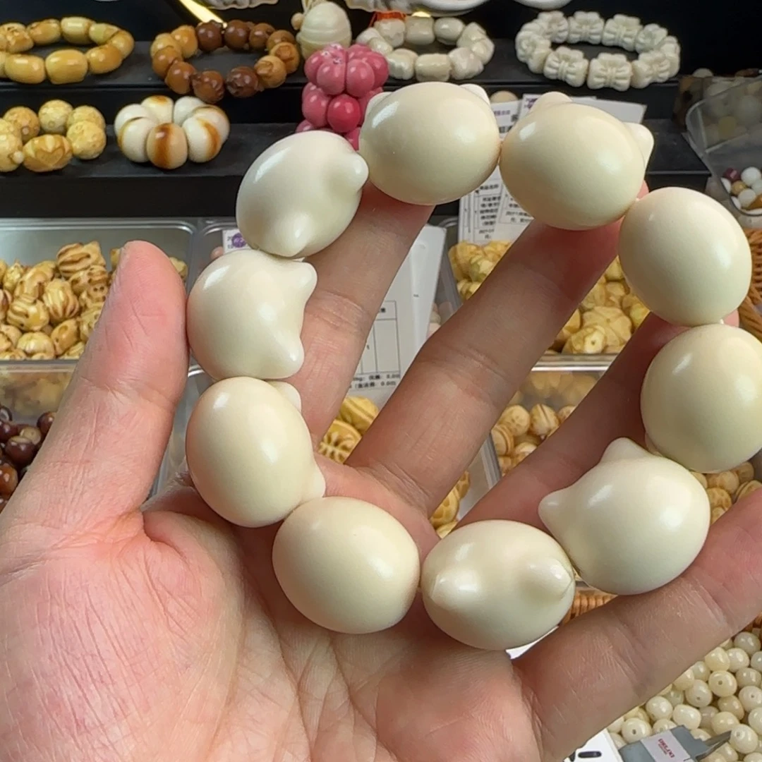 吊坠菩提根/象牙果微瑕疵卡25白色猫头手串一条