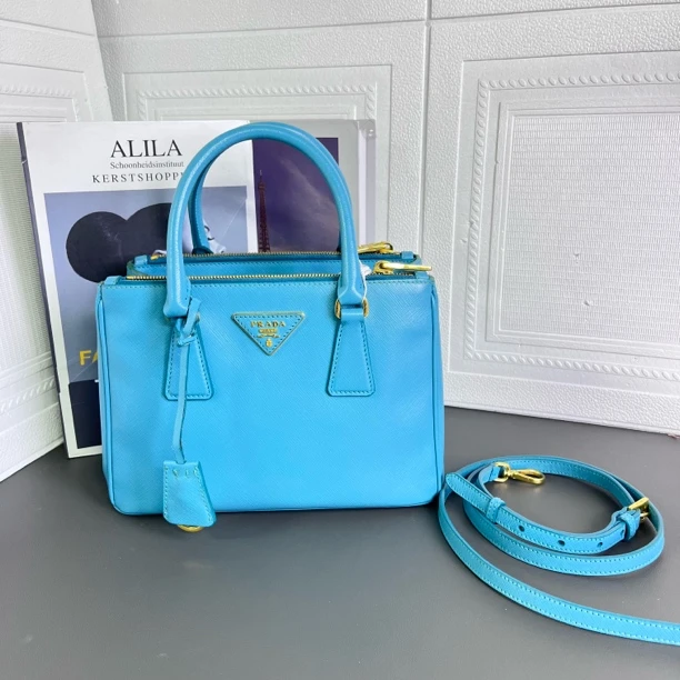 95新 Prada/普拉达 孔雀蓝杀手底长25手提斜挎包