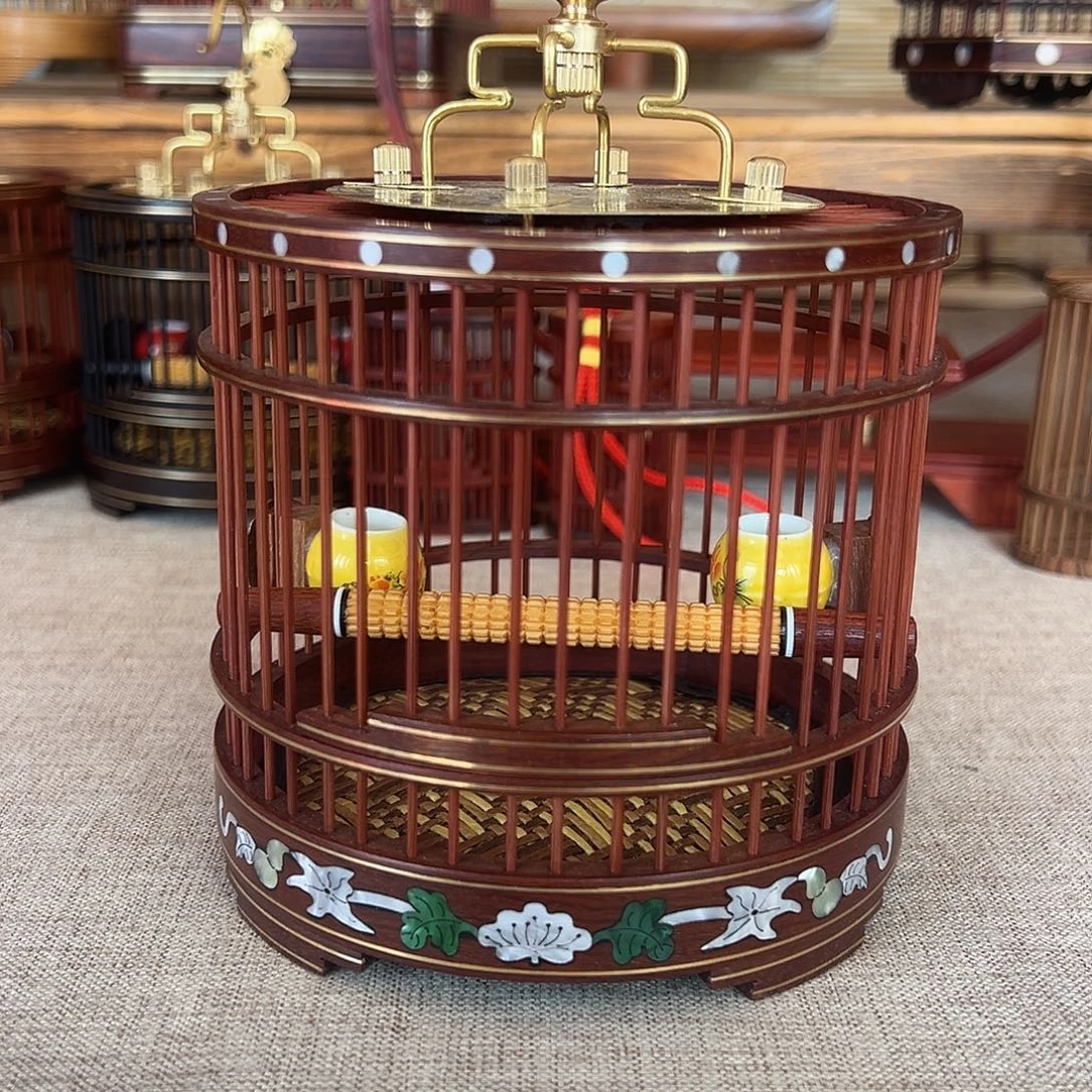 u***6红檀木，直径12厘米镶花工艺圆笼一个