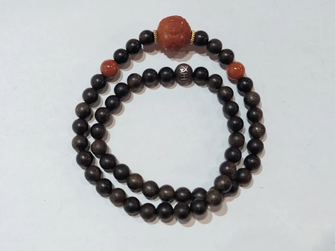 沉香 金丝凤缕纹黑奇楠长串0.8