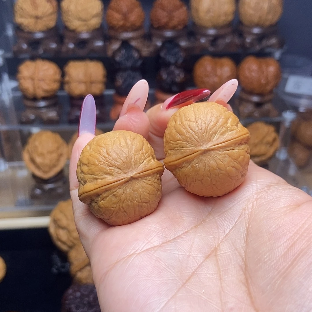 魏***蛋文玩核桃吊坠4……云滇蛇皮球