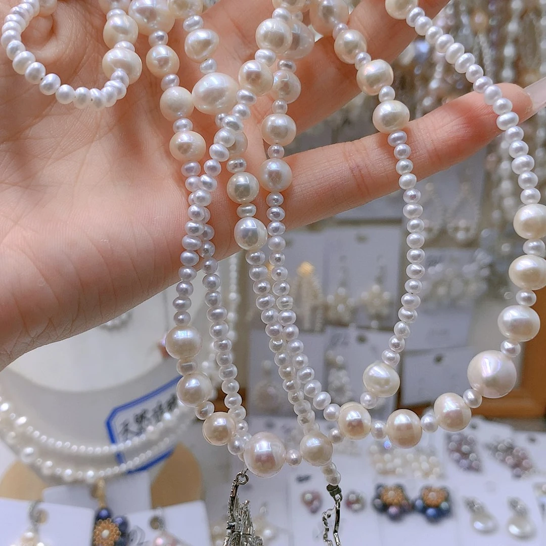 银S925镶嵌耳饰淡水珍珠雅*