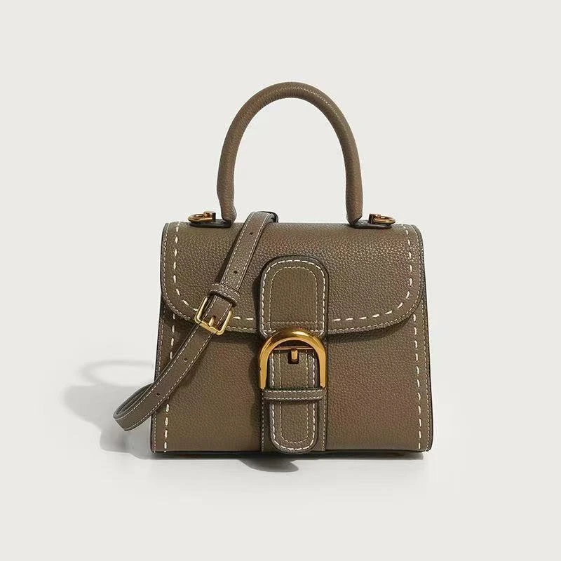 轻奢小众马蹄包真皮手提单肩斜跨女包百搭A0531