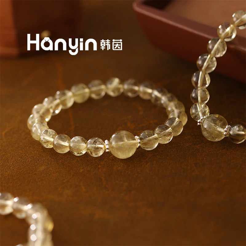 8/12mm生长纹黄水晶马上有钱花弹力水晶手串