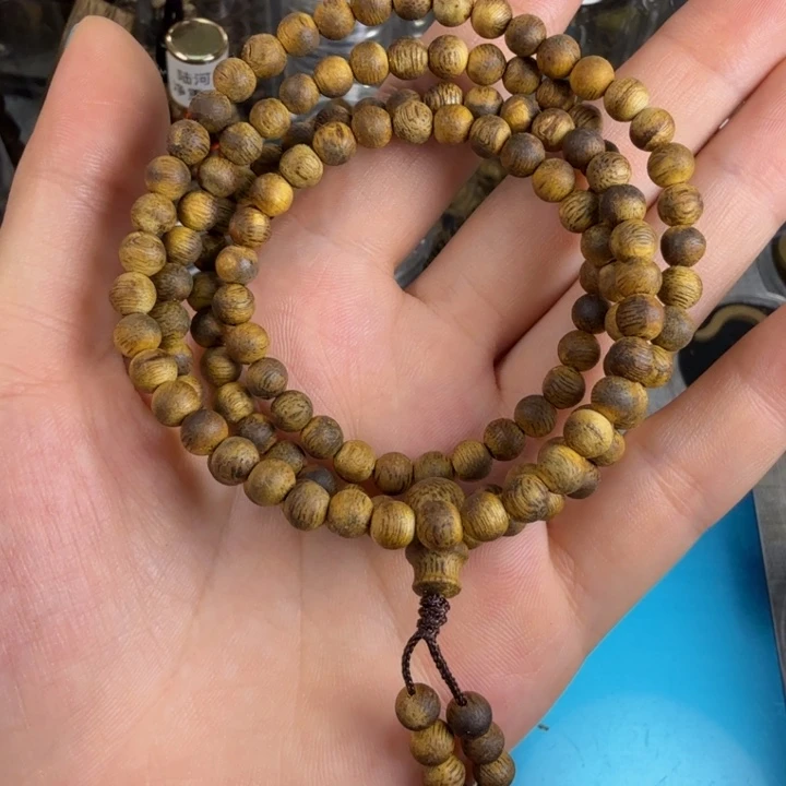 丁***喵沉香碎屑沉香莺歌绿奇楠05淳化圆珠多圈