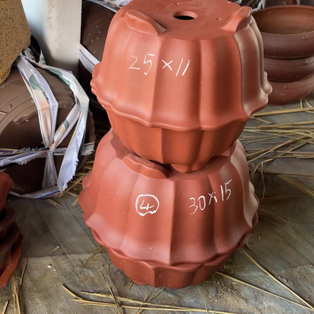 紫砂一组四只莲花