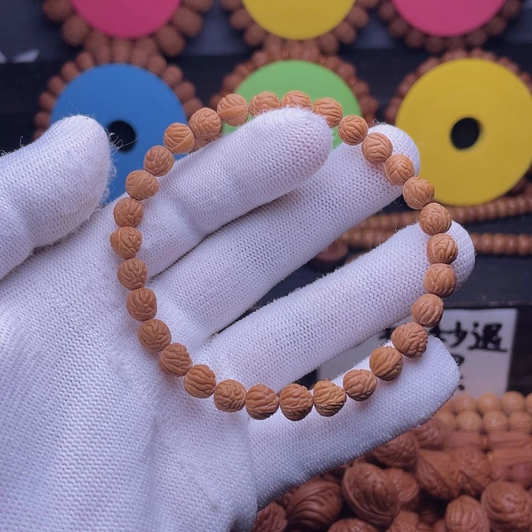 旭***桃核手串秦岭龙纹桃核小金豆单圈30颗籽