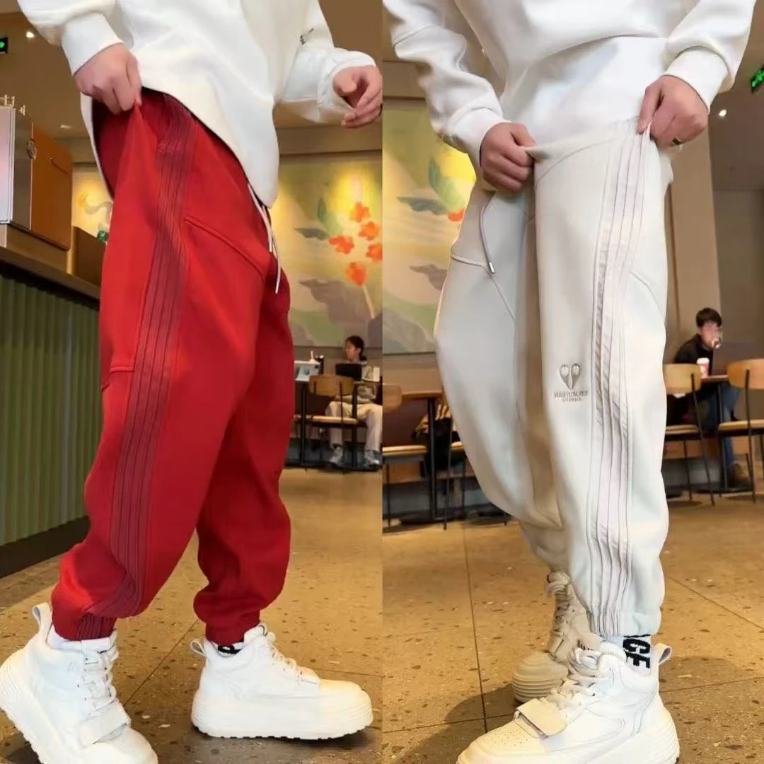 冬季新款加绒束脚裤男时尚百搭宽松休闲裤百搭侧条纹运动哈伦卫裤