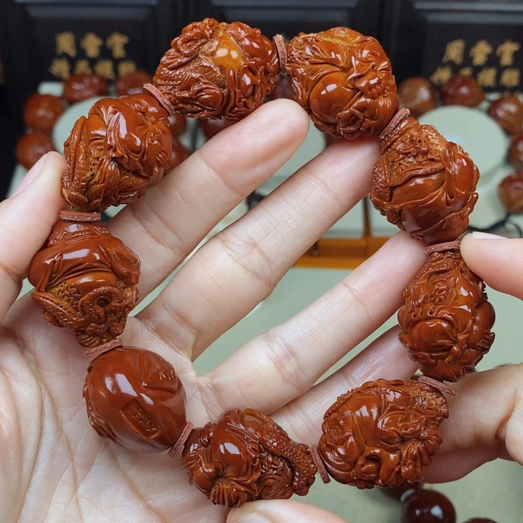 弟***弟橄榄核吊坠龙财神