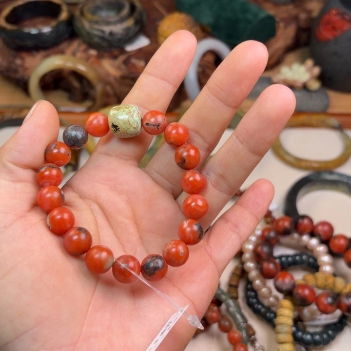 邵***奶南红玛瑙未镶嵌手链