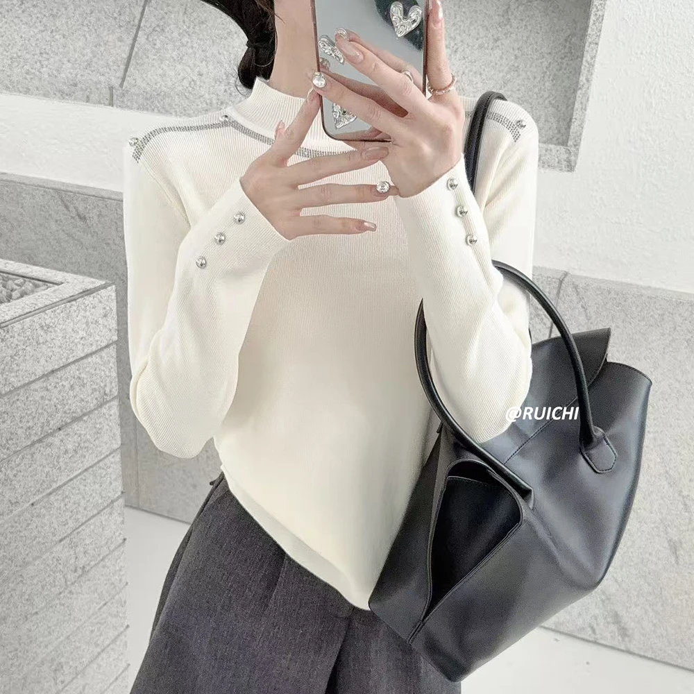 韩系2026新款轻奢立领钉钻设计感珍珠纽扣长袖修身针织上衣