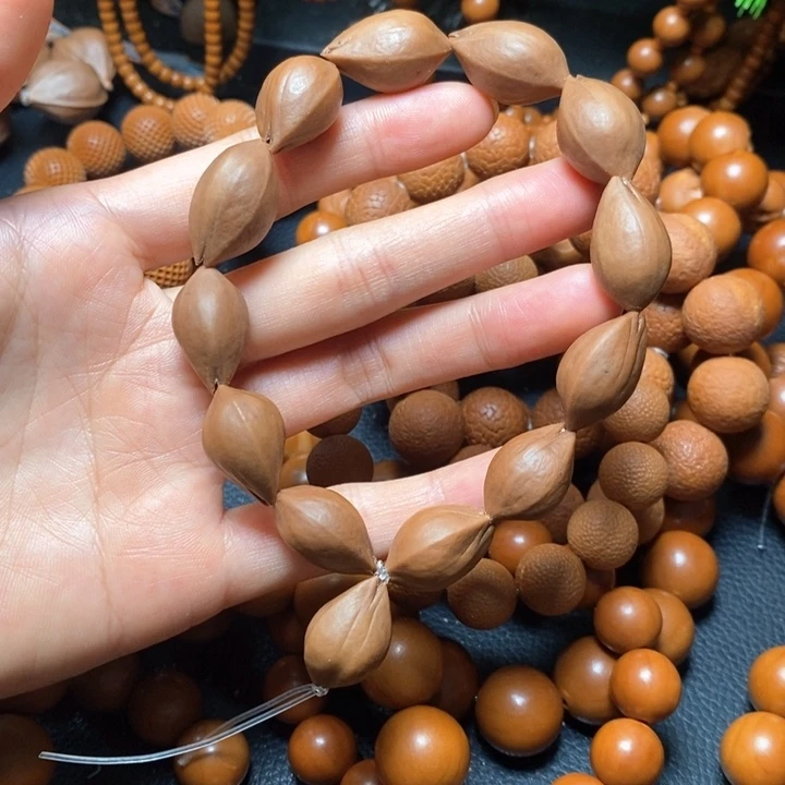 橄榄核手串Y*1.4尺寸原皮18颗
