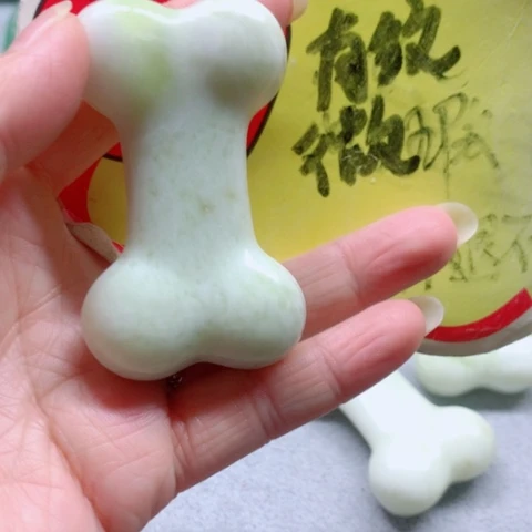 郑***7蛇纹石玉未镶嵌手把件