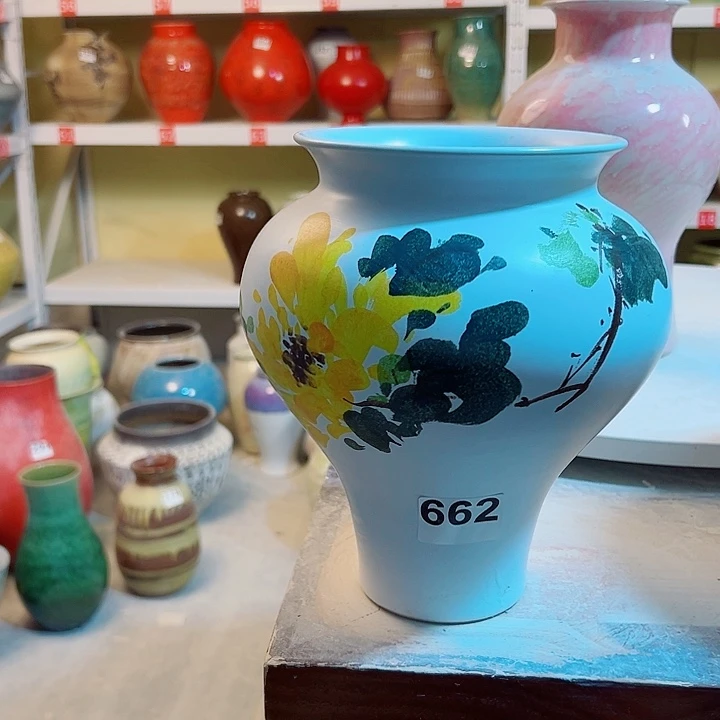 蓝***色瓷片高23口11。摆件。662