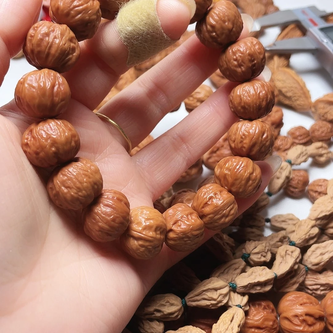 博***读文玩核桃吊坠方肚