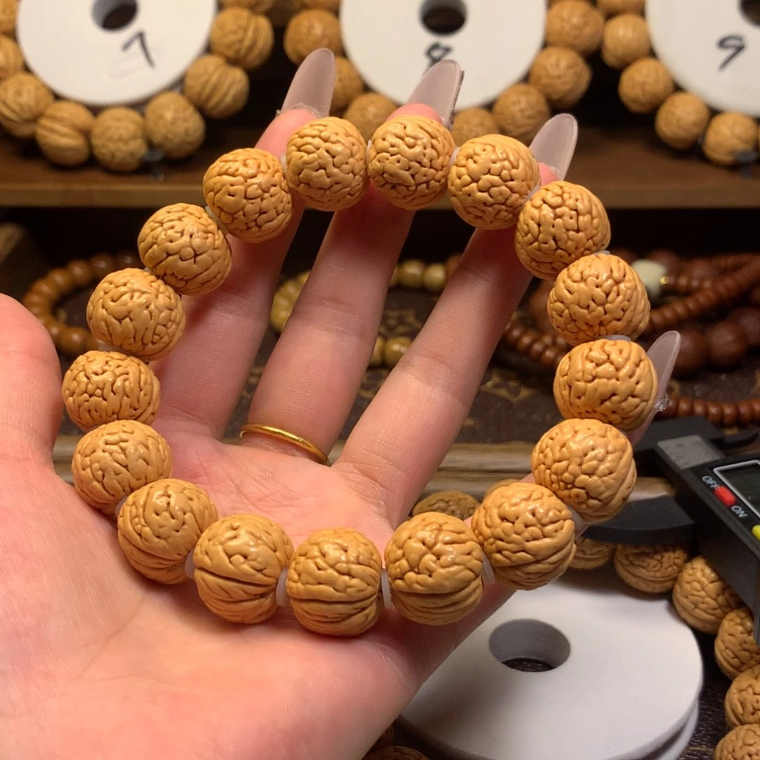 你*谁精品桃核文玩手串铁扇