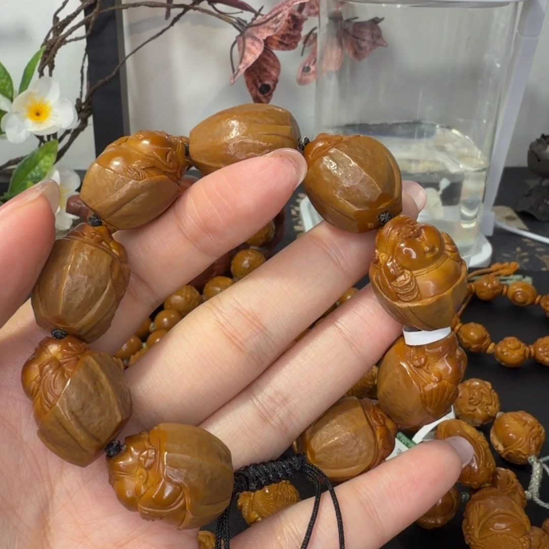 乡***哥橄榄核手串/手链包衣财神