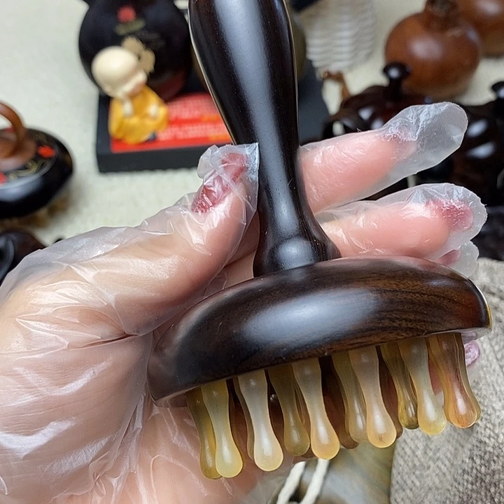 紫光檀手柄款28齿按摩梳
