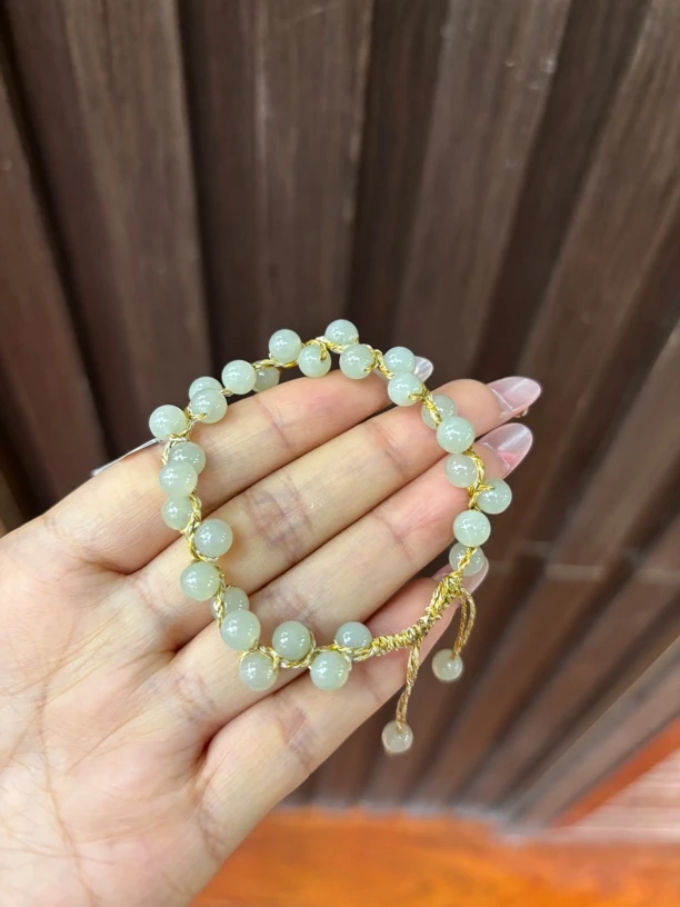 060614 和田玉青海料手工编织手链约6mm多样性发其一