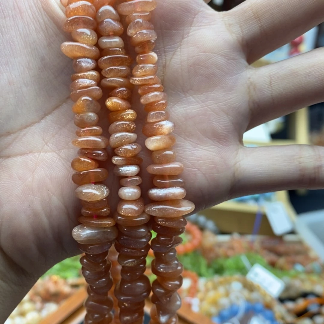 玛瑙/玉髓未镶嵌珠宝半成品一条天然中孔金太阳随型隔片