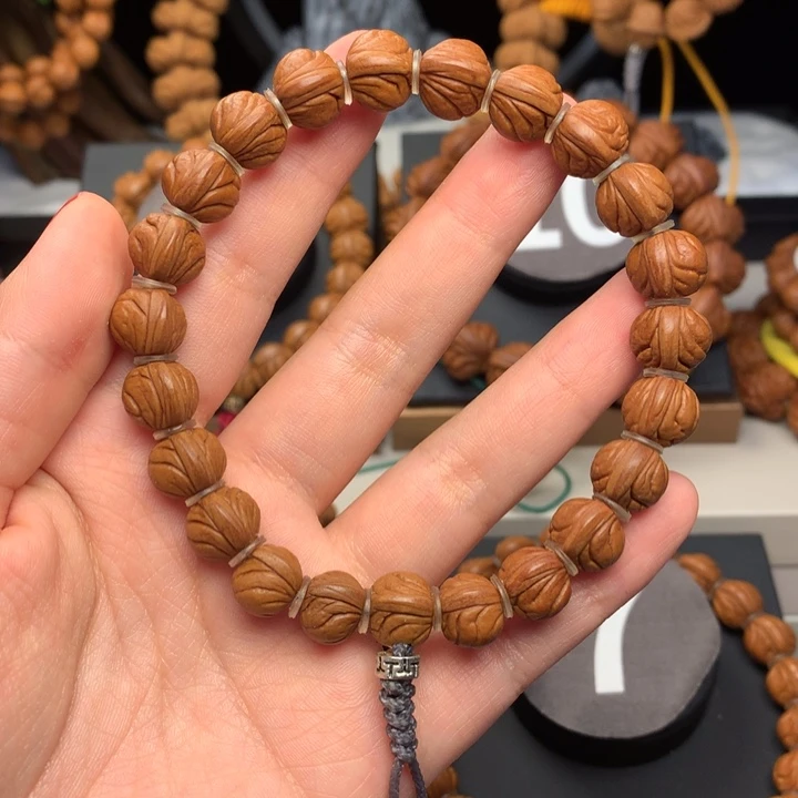 千***鹤桃核吊坠野生玉龙脊11尺寸