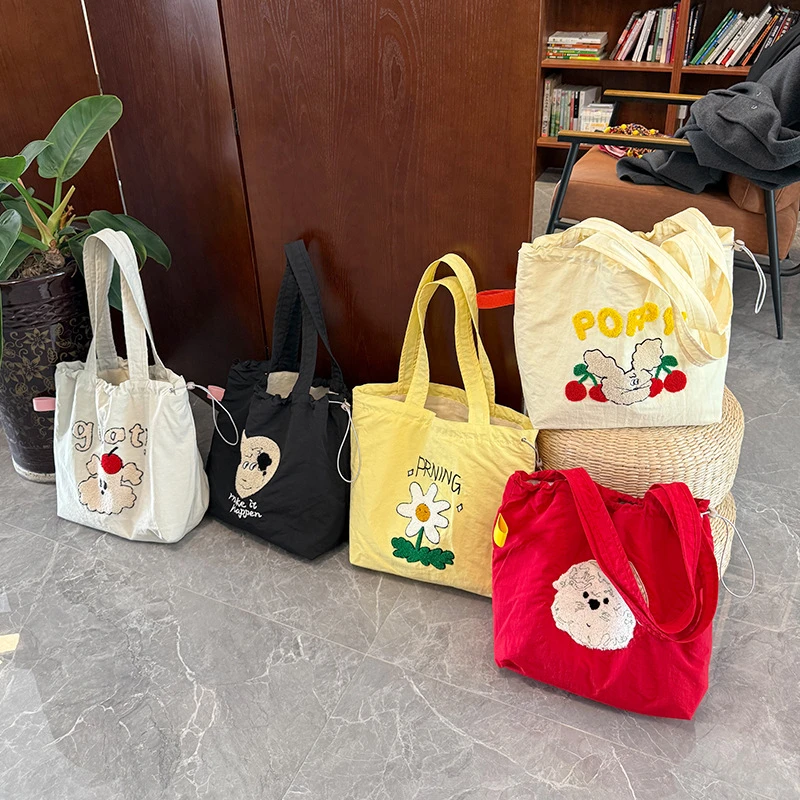 春季新款时尚毛巾绣便携式托特大容量时尚百搭包抽绳束口单肩包