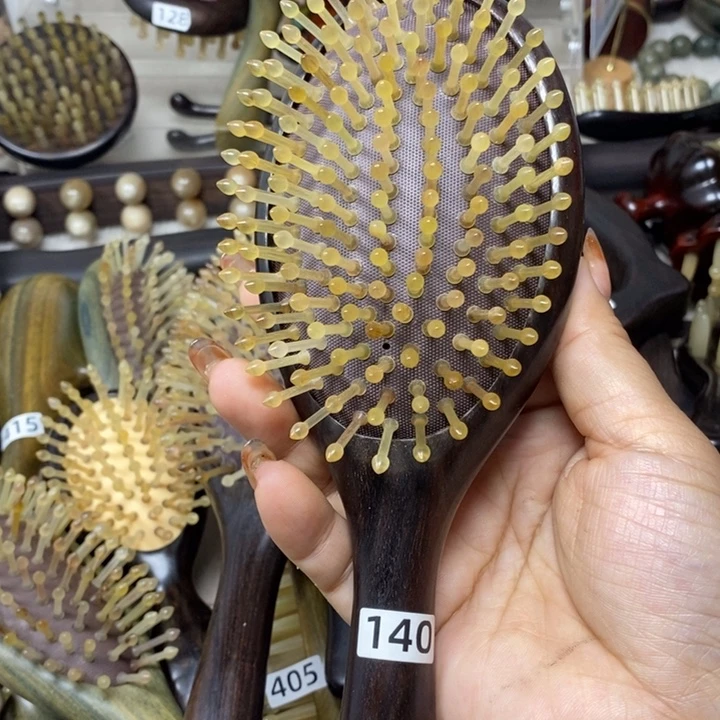 紫光檀金齿气垫顺发梳