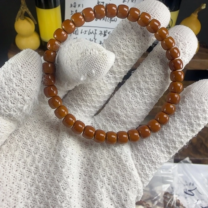 橄榄核吊坠6.4mm 老挝核核尖全品红核