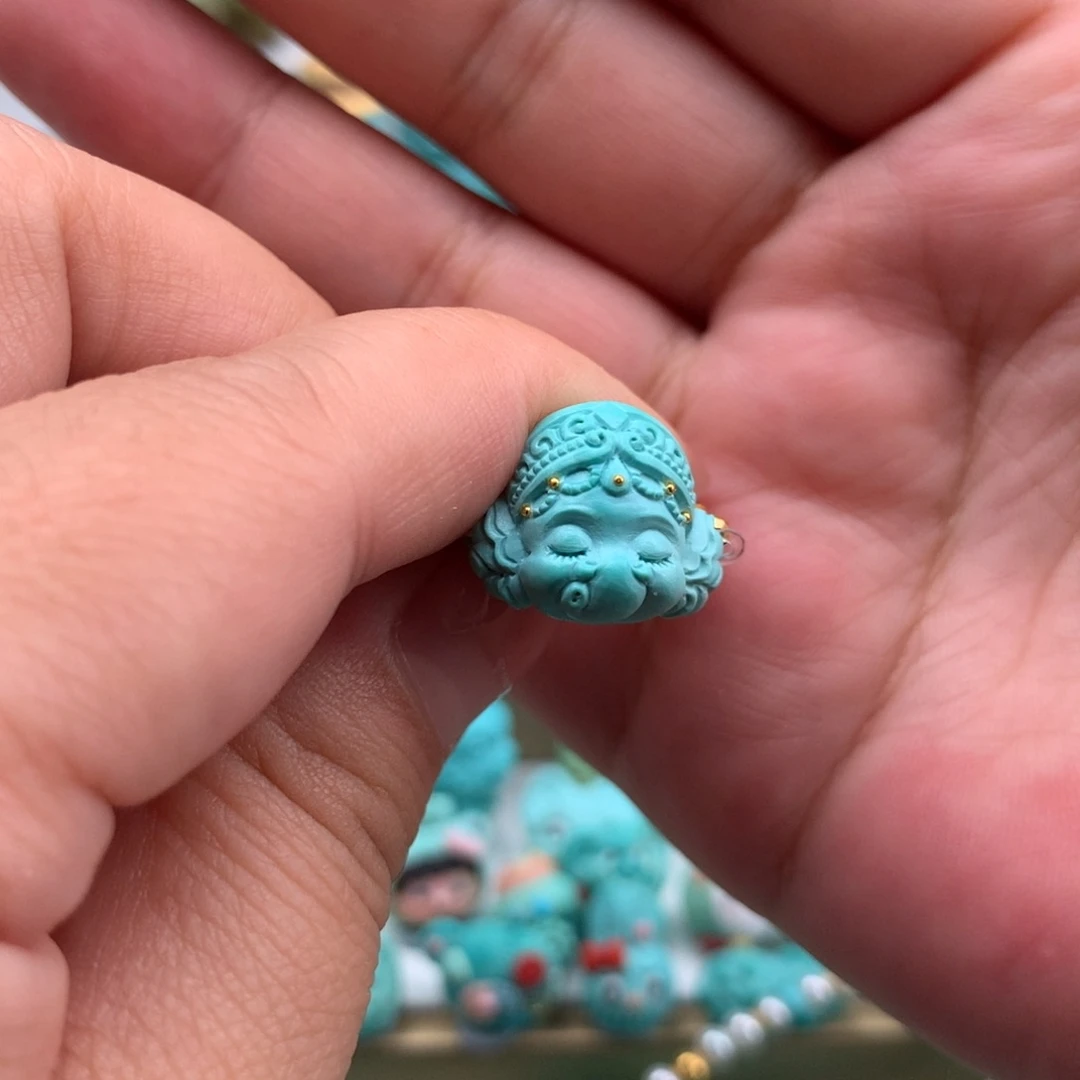 婉***妮未镶嵌绿松石耳饰