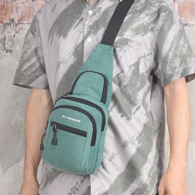 休闲百搭胸包文艺风简约纯色帆布手机小包男女日常斜挎包防水尼龙