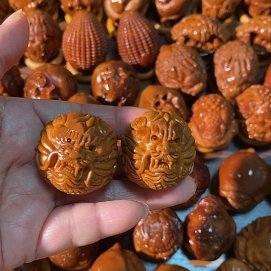 橄榄核把件爱**音核雕龙球一对