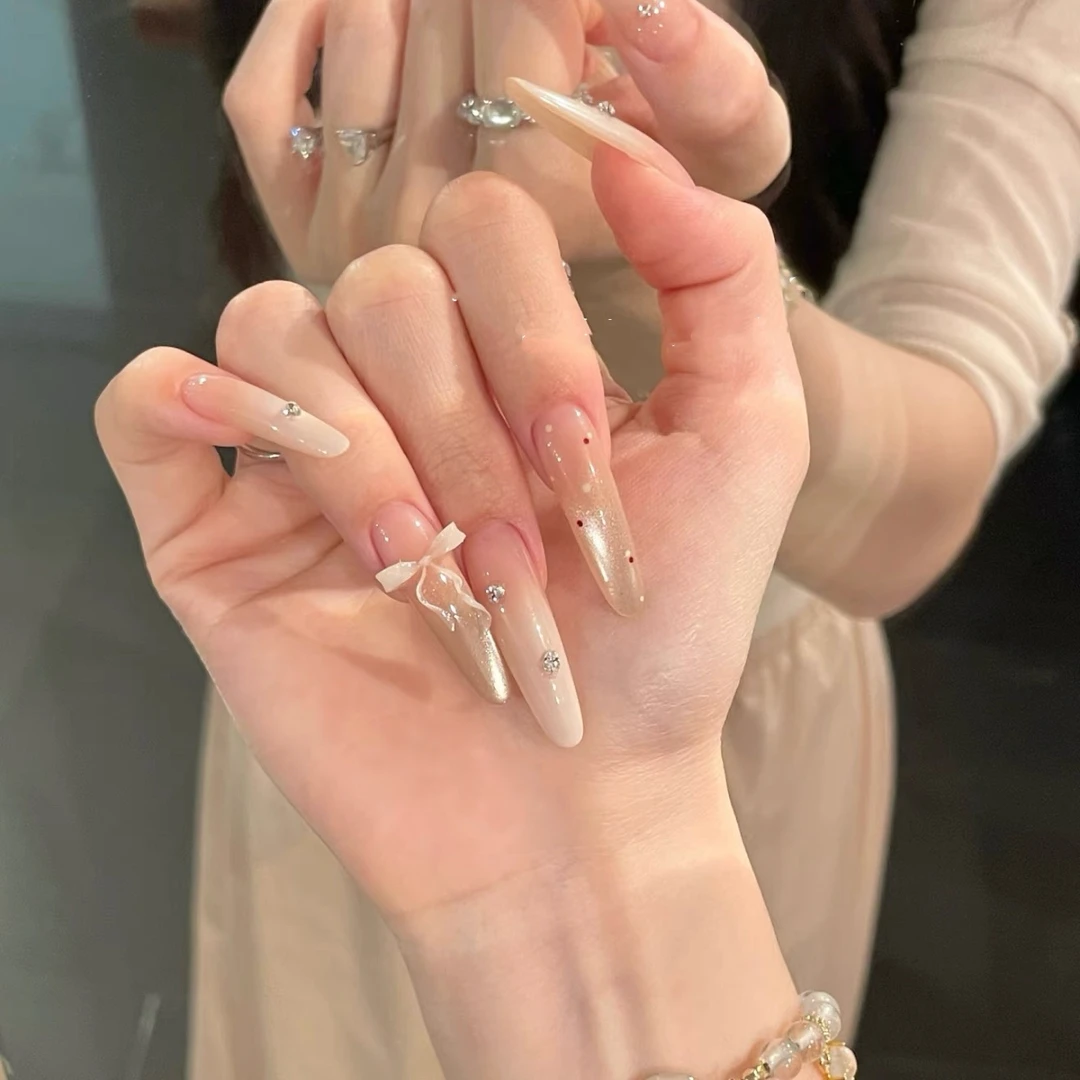 温柔丝带蝴蝶结猫眼美甲纯手工裸色冰透显白穿戴甲高级气质纯欲风