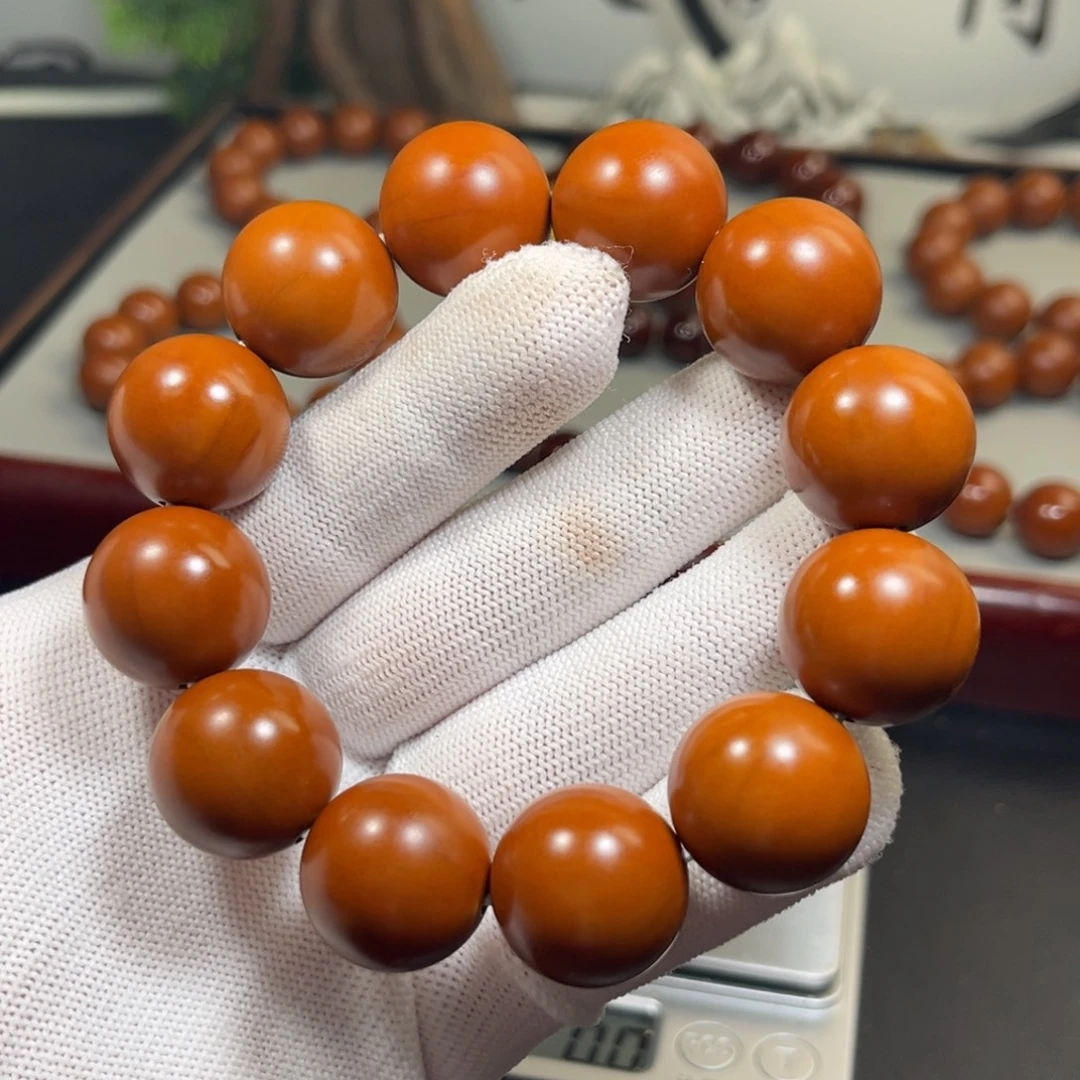 蓝***～手串橄榄核1.98+树王精品铁核 小孔