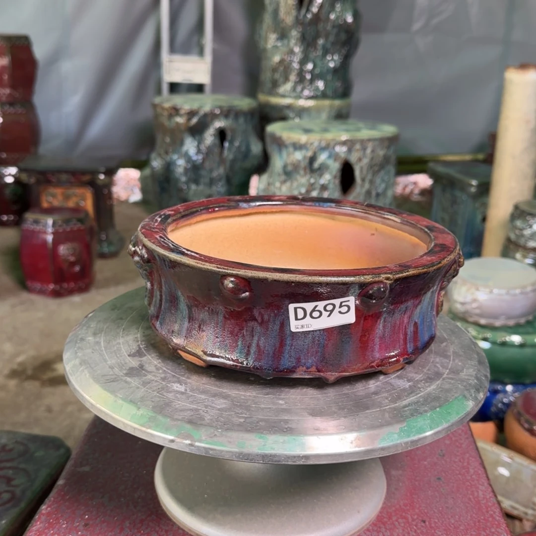 红泥花盆周*琴695。