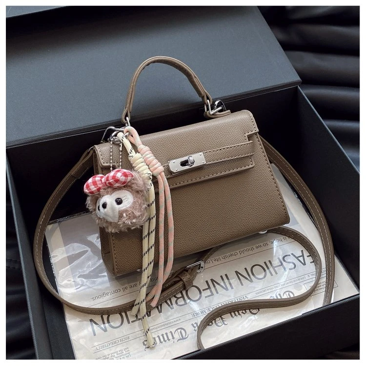 韩版简约手提凯莉包女2025新款高级感通勤斜挎包洋气单肩包小方包