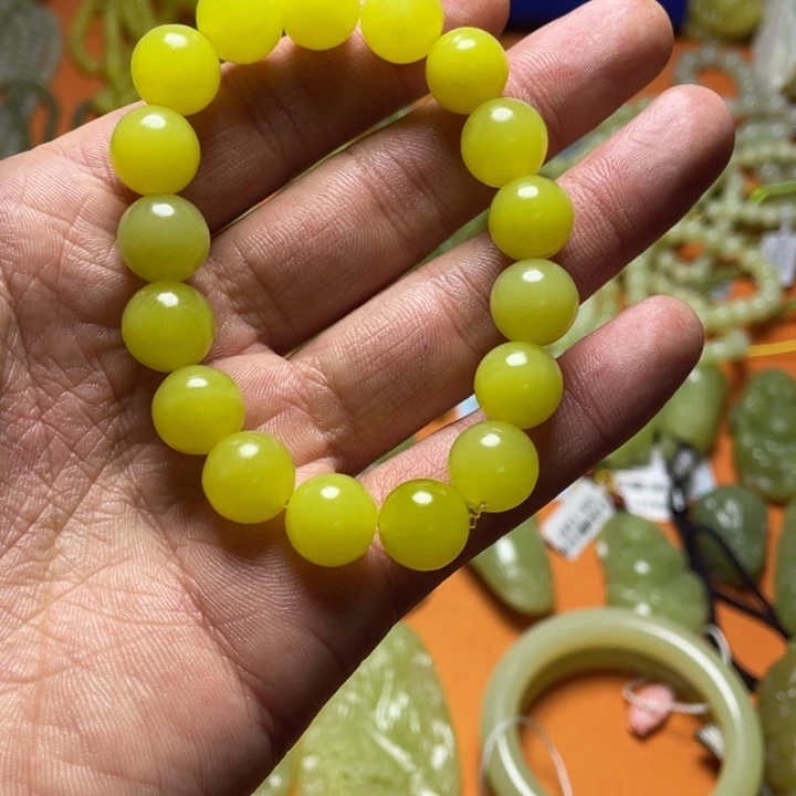 刚****非金属新疆黄玉手串卡12