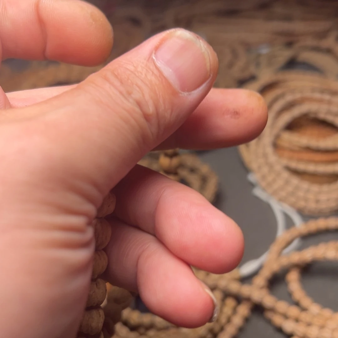 卡***园柏香籽/百香籽吊坠