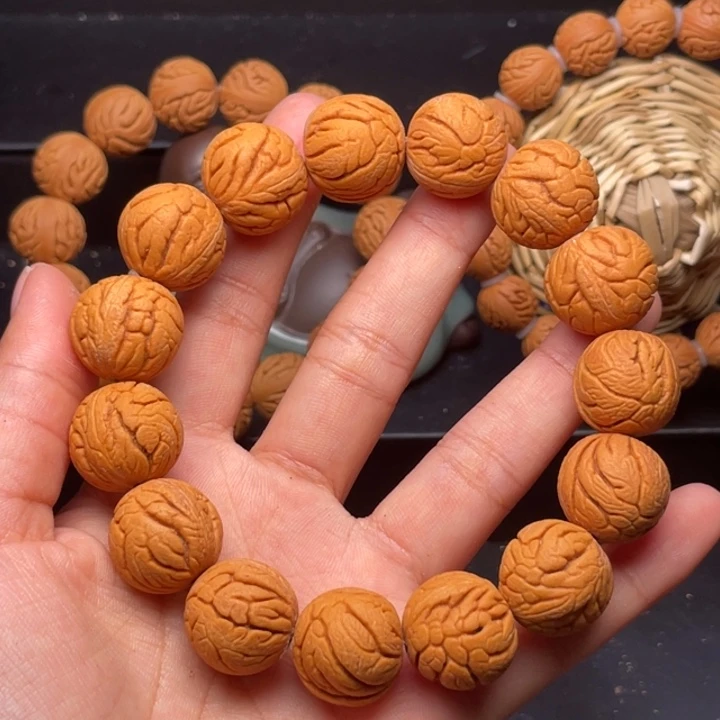 桃核手串金丝龙珠18