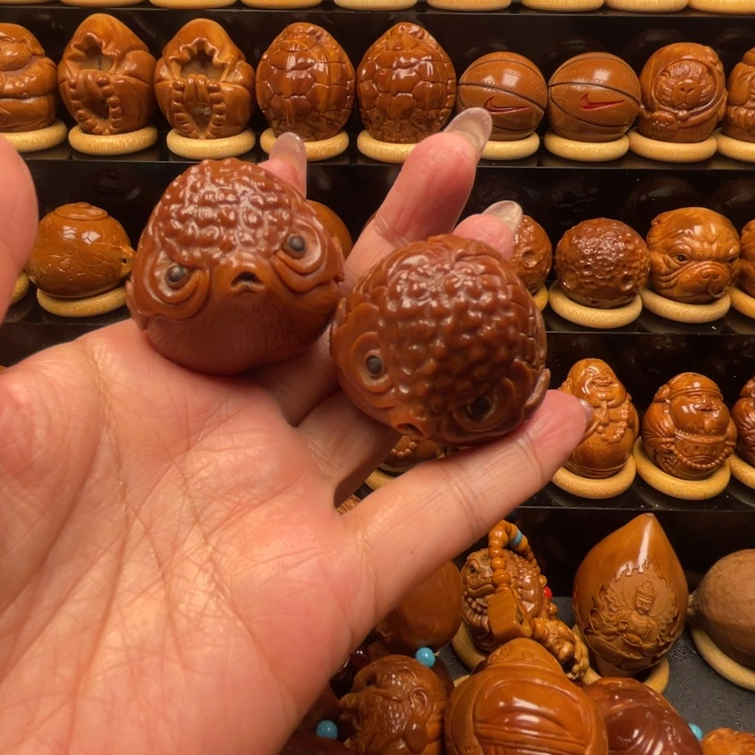 *****把件橄榄核手持手球