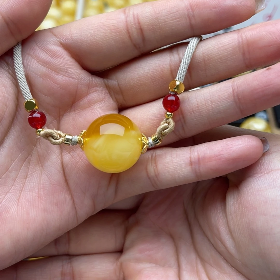 琥珀未镶嵌裸石蜜蜡圆珠微瑕笑