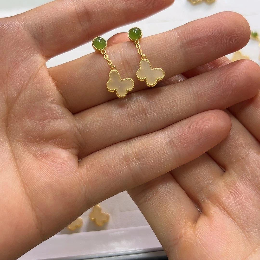 和田玉银S925镶嵌耳饰波**惊