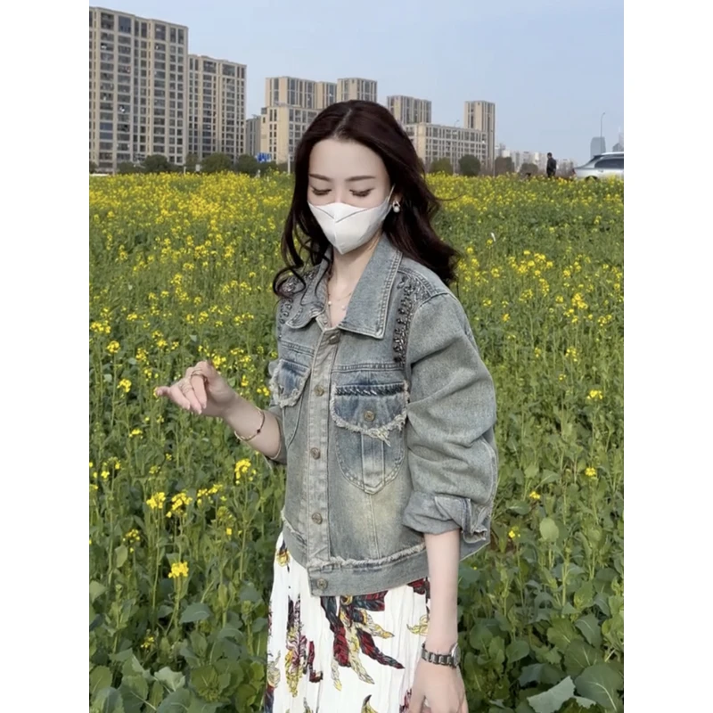 东大门重工钉珠牛仔外套女2025早春新款宽松别致百搭小个子上衣