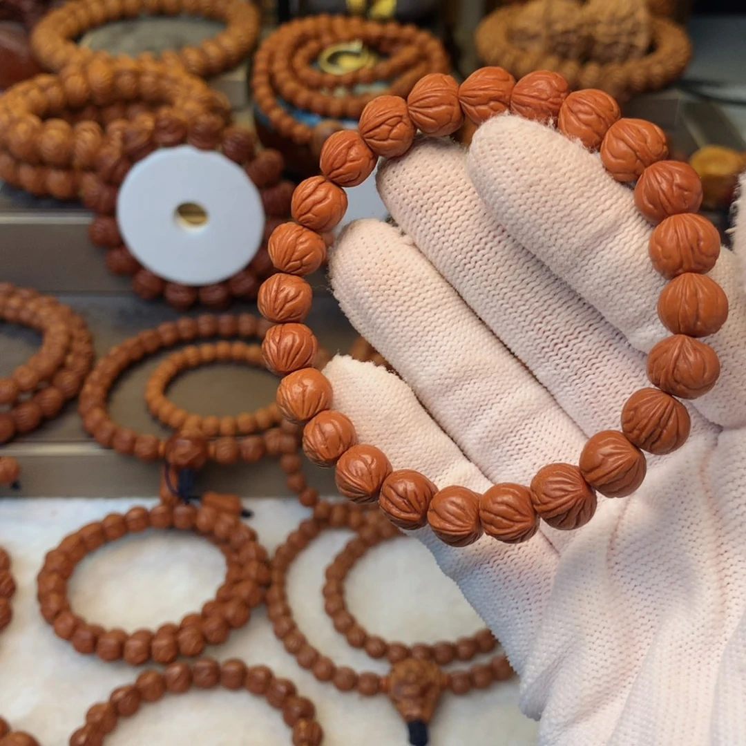 温***光手串桃核秦岭龙纹