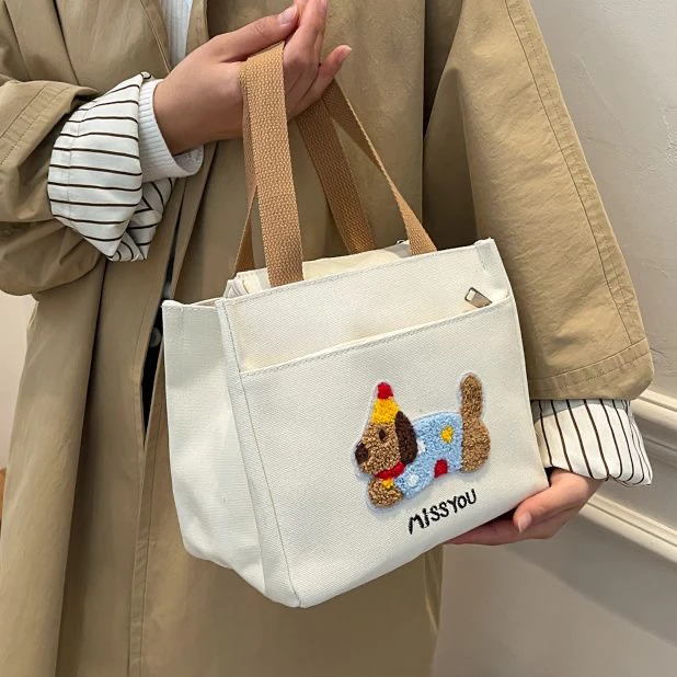 新款高颜值腊肠狗帆布手提包外出简约便携上班通勤小拎包便当包