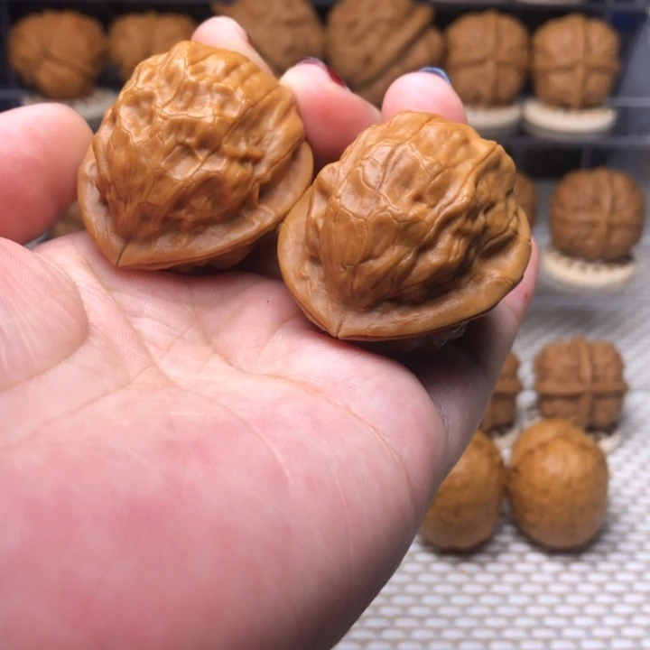 文玩核桃把件32云纹桃心36尺