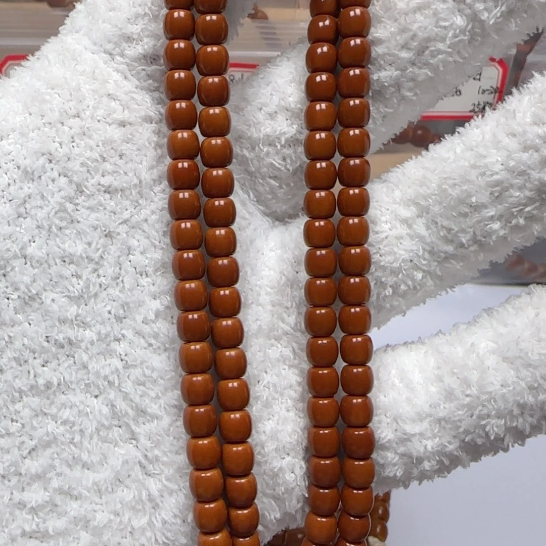 橄榄核吊坠老挝5.7mm全无白脖挂